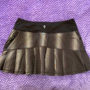 IVIVA SIZE 12 black and silver tennis skirt